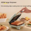 3 in 1 Electric Sandwich Toast, Waffle, Pancake, Donut, Egg , Waffle, Fish, Cake Grill Coating Making Machine for Breakfast  Horno eléctrico (Random color) - Image 8
